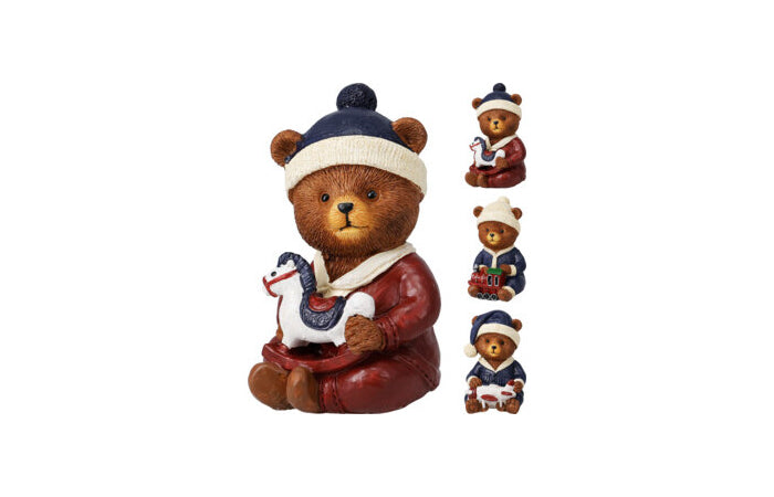 Orso natalizio seduto in poliresina 11,5 cm con giocattolo
