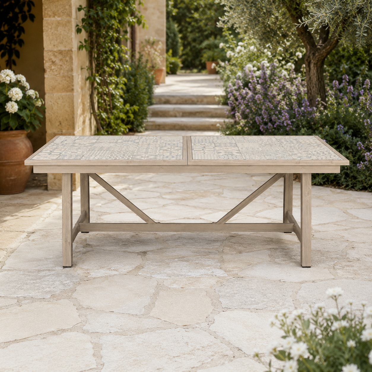 Tavolo da giardino allungabile 212-285x106 cm con piano in ceramica smaltata e finitura effetto legno. Ideale per 8-10 persone. Struttura robusta per terrazzo e veranda.