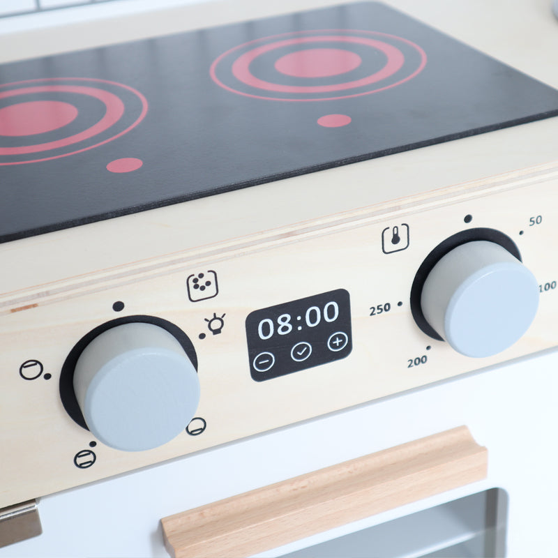 Cucina giocattolo in legno, foto pomelli forno